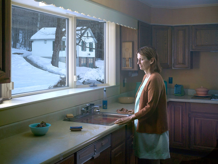 a-woman-watching-in-the-kitchen-